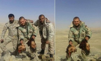 Σύροι στρατιώτες ποζάρουν με κομμένα κεφάλια τζιχαντιστών στην Παλμύρα